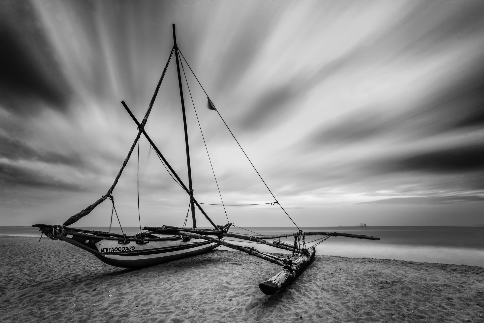 Travel Photographer of the Year Finalist Sri Lanka Outrigger fishing boat on Negombo Beach at sunrise Sri Lanka Asia