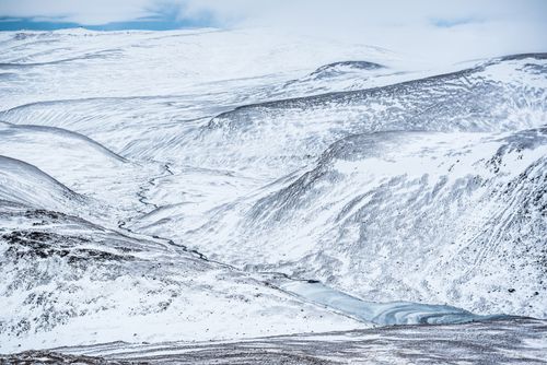 Landscape Photography by Professional Freelance UK Landscape Photographer Cairn Gorm Mountain covered in snow in winter Cairngorms National Park Scotland United Kingdom Europe