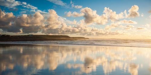 Landscape Photography by Professional Freelance UK Landscape Photographer Cloud reflections at Constantine Bay at sunset Cornwall England United Kingdom Europe