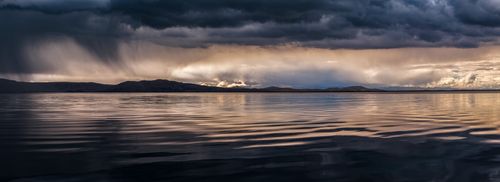 Landscape Photography by Professional Freelance UK Landscape Photographer Dramatic storm clouds over Lake Titicaca Peru South America