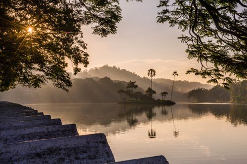 Landscape Photography by Professional Freelance UK Landscape Photographer Kandy Lake and the island which houses the Royal Summer House at sunrise Kandy Central Province Sri Lanka Asia