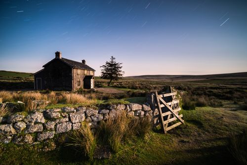 Landscape Photography by Professional Freelance UK Landscape Photographer Nuns Cross Farm under stars Dartmoor National Park Devon England United Kingdom Europe